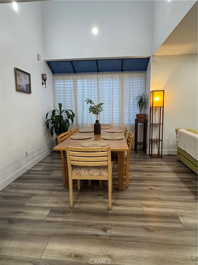 682 East Workman Street Covina, CA 91723 - Photo 14 of 36 a dining room with furniture and wooden floor