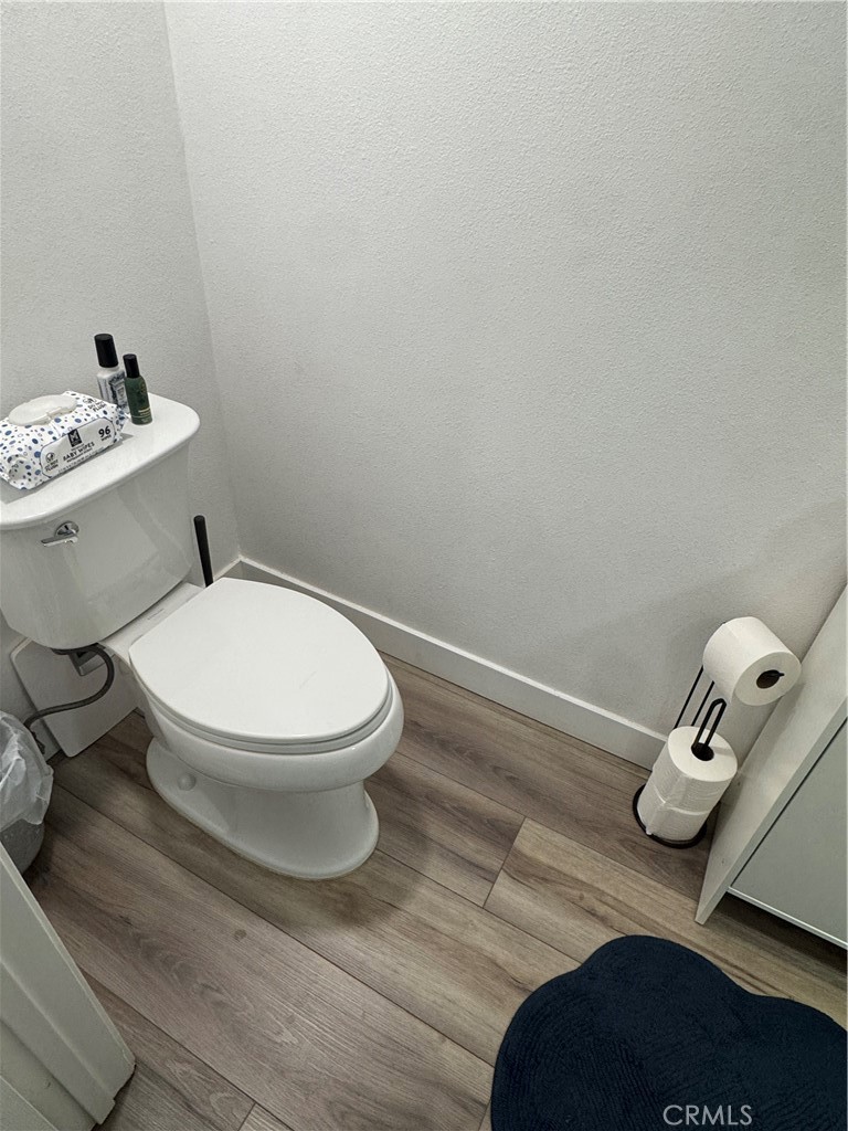 682 East Workman Street Covina, CA 91723 - Photo 16 of 34 a white toilet sitting next to a bathroom sink