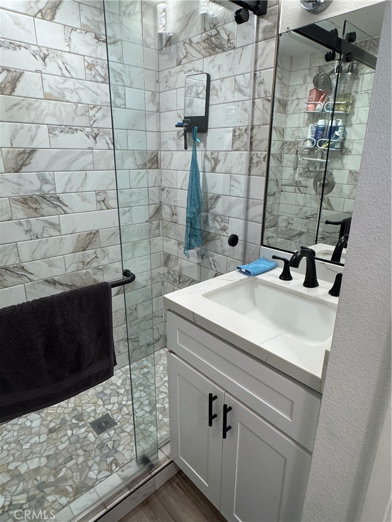 682 East Workman Street Covina, CA 91723 - Photo 17 of 34 a bathroom with a sink and a mirror