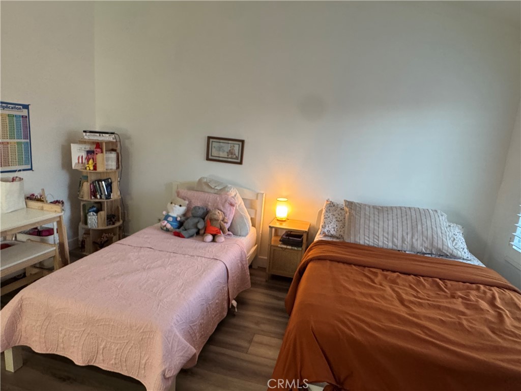 682 East Workman Street Covina, CA 91723 - Photo 27 of 36 a bedroom with bed and a night stand