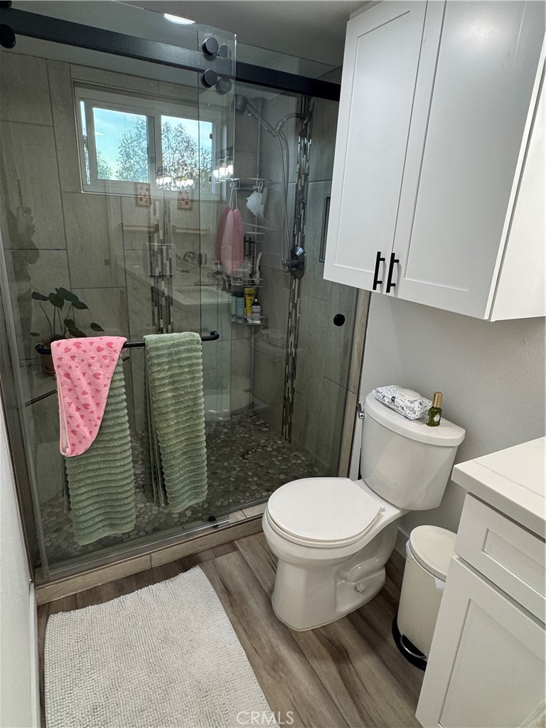 682 East Workman Street Covina, CA 91723 - Photo 30 of 36 a bathroom with a toilet and a shower