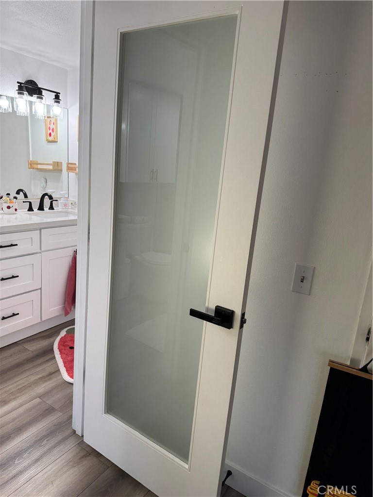 682 East Workman Street Covina, CA 91723 - Photo 32 of 36 a bathroom with a sink and a mirror