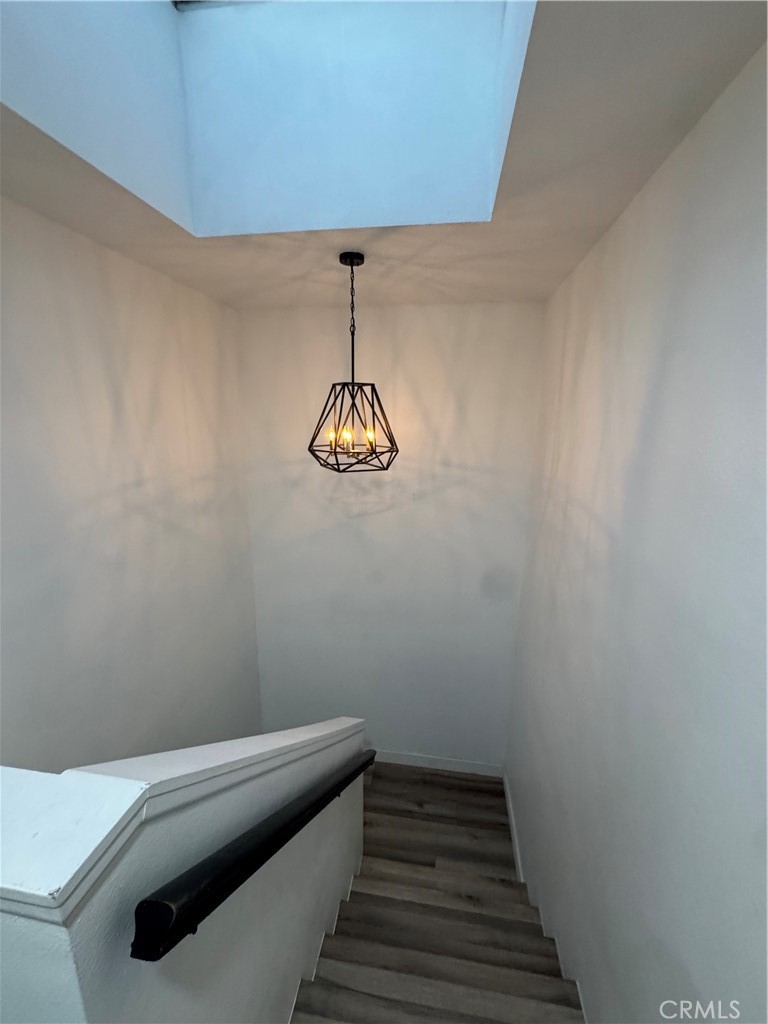 682 East Workman Street Covina, CA 91723 - Photo 33 of 34 a bathroom with a shower and chandelier