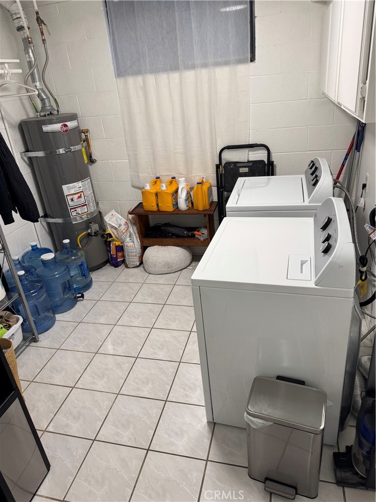 682 East Workman Street Covina, CA 91723 - Photo 36 of 36 a room with chair and white cabinets