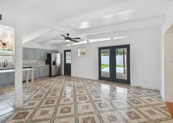a view of a kitchen with a sink and a stove