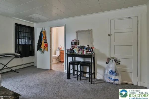 a bathroom with a toilet and sink