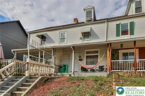 front view of a house with a porch