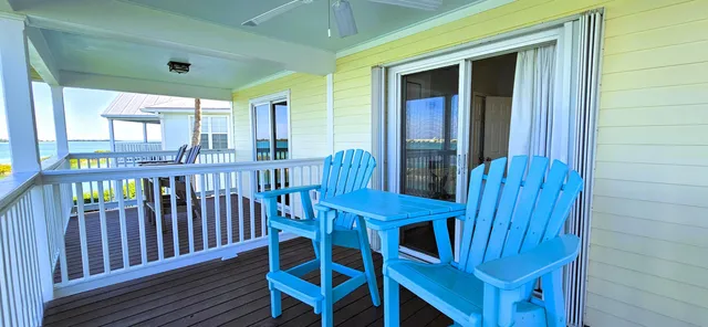 a view of a balcony dining area