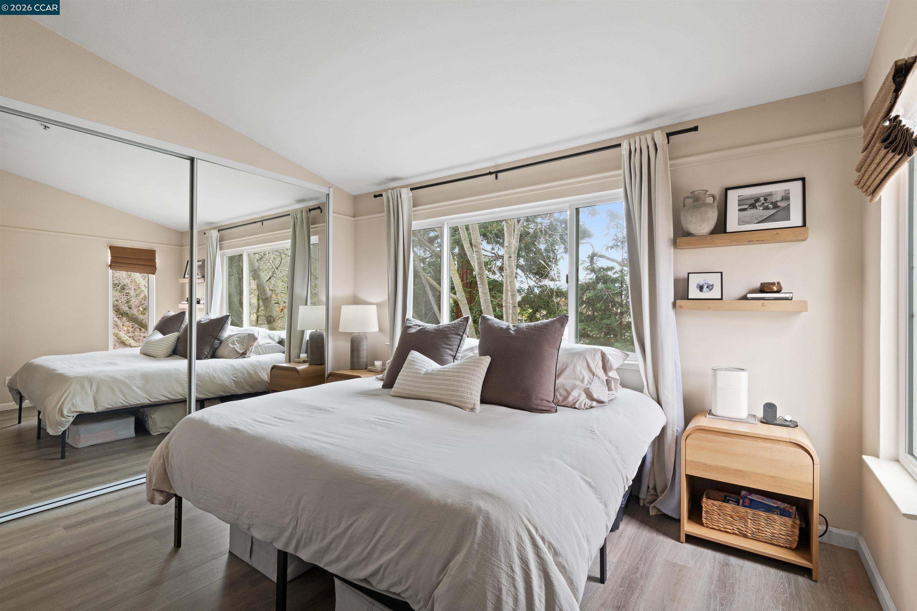 2721 Oak Road, Unit L Walnut Creek, CA 94597 - Photo 14 of 25 a bedroom with bed and wooden floor