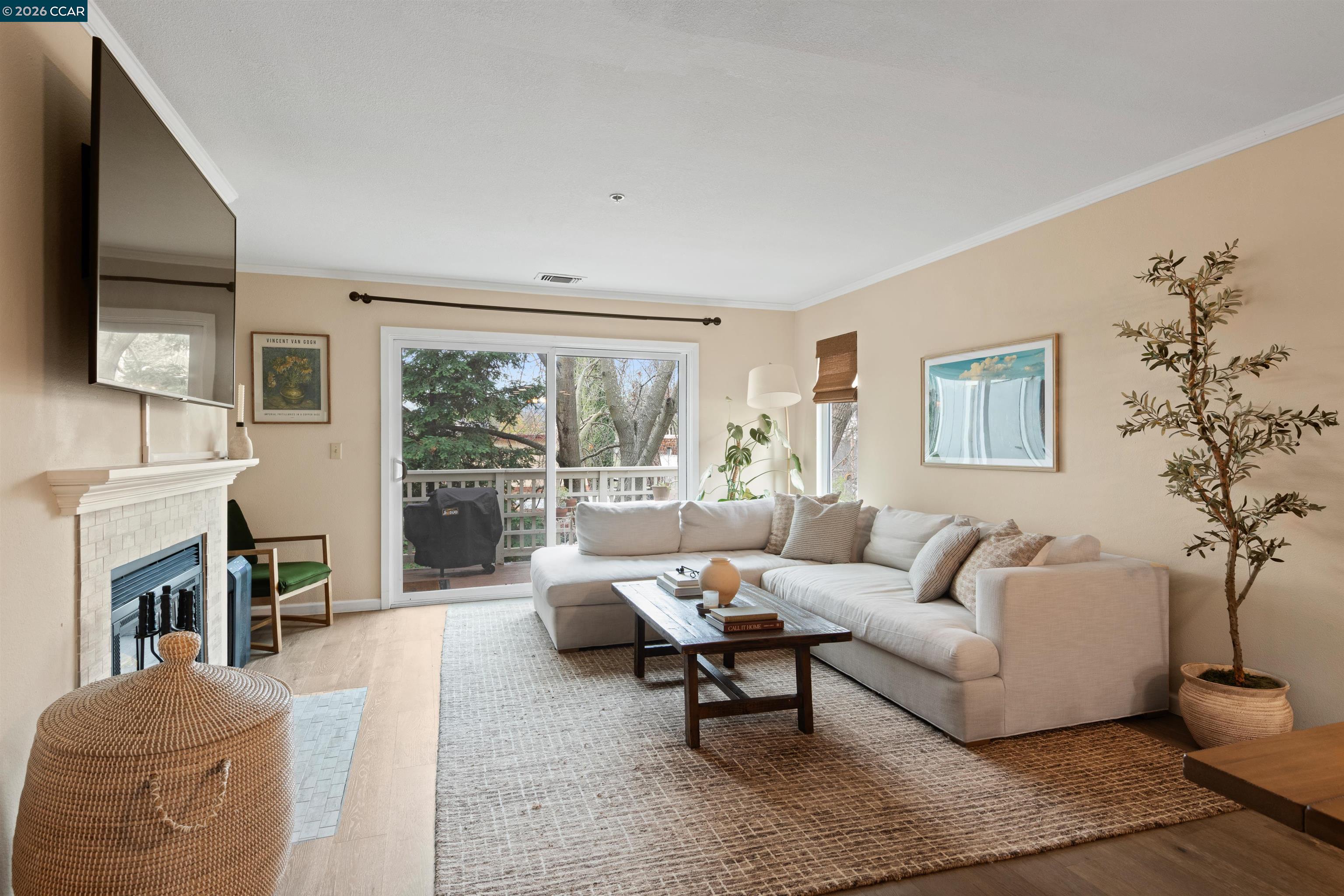 2721 Oak Road, Unit L Walnut Creek, CA 94597 - Photo 8 of 25 a living room with furniture large window and a table