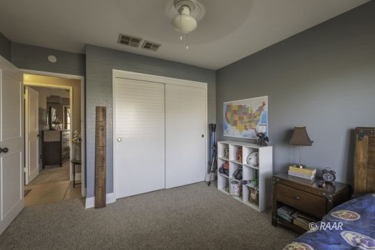 815 James Street Ridgecrest, CA 93555 - Photo 14 of 27 a living room with furniture and a flat screen tv