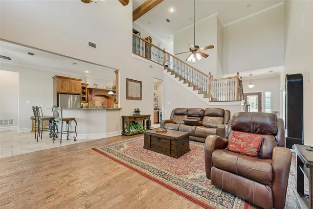 a kitchen with granite countertop a sink and cabinets
