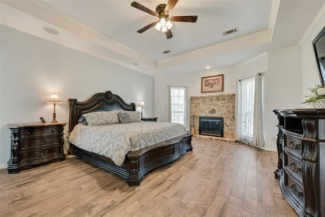 a large bathroom with a double vanity sink a mirror and a