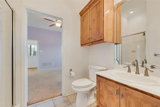 a workspace with wooden floor and a window