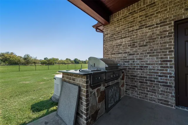 a living room with furniture and a garage