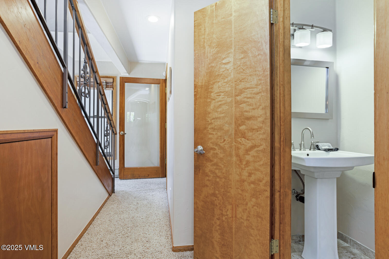 425 Deer Boulevard, Unit B Eagle-Vail, CO 81620 - Photo 13 of 26 a view of a bathroom from the hallway
