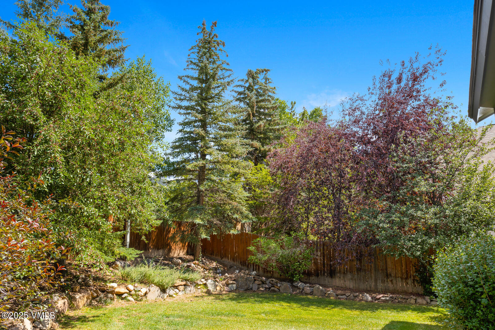 425 Deer Boulevard, Unit B Eagle-Vail, CO 81620 - Photo 23 of 26 a view of a swimming pool with an outdoor space and seating area