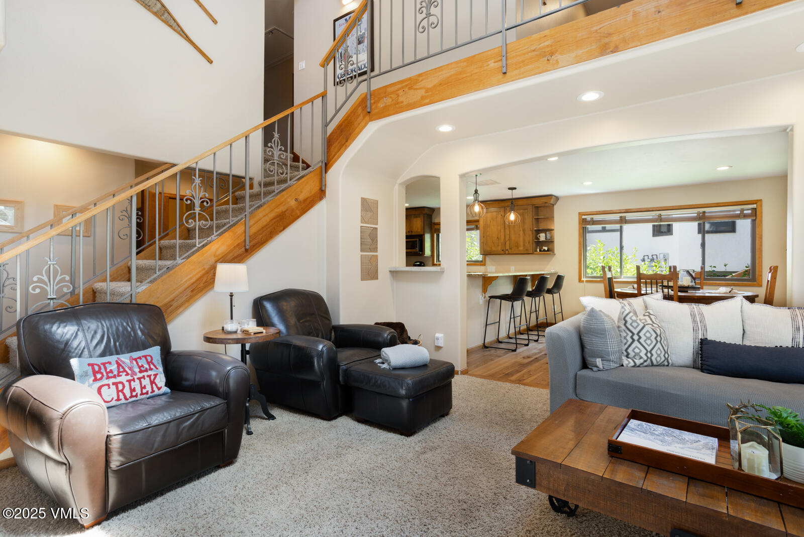 425 Deer Boulevard, Unit B Eagle-Vail, CO 81620 - Photo 5 of 26 a living room with furniture and a ceiling fan