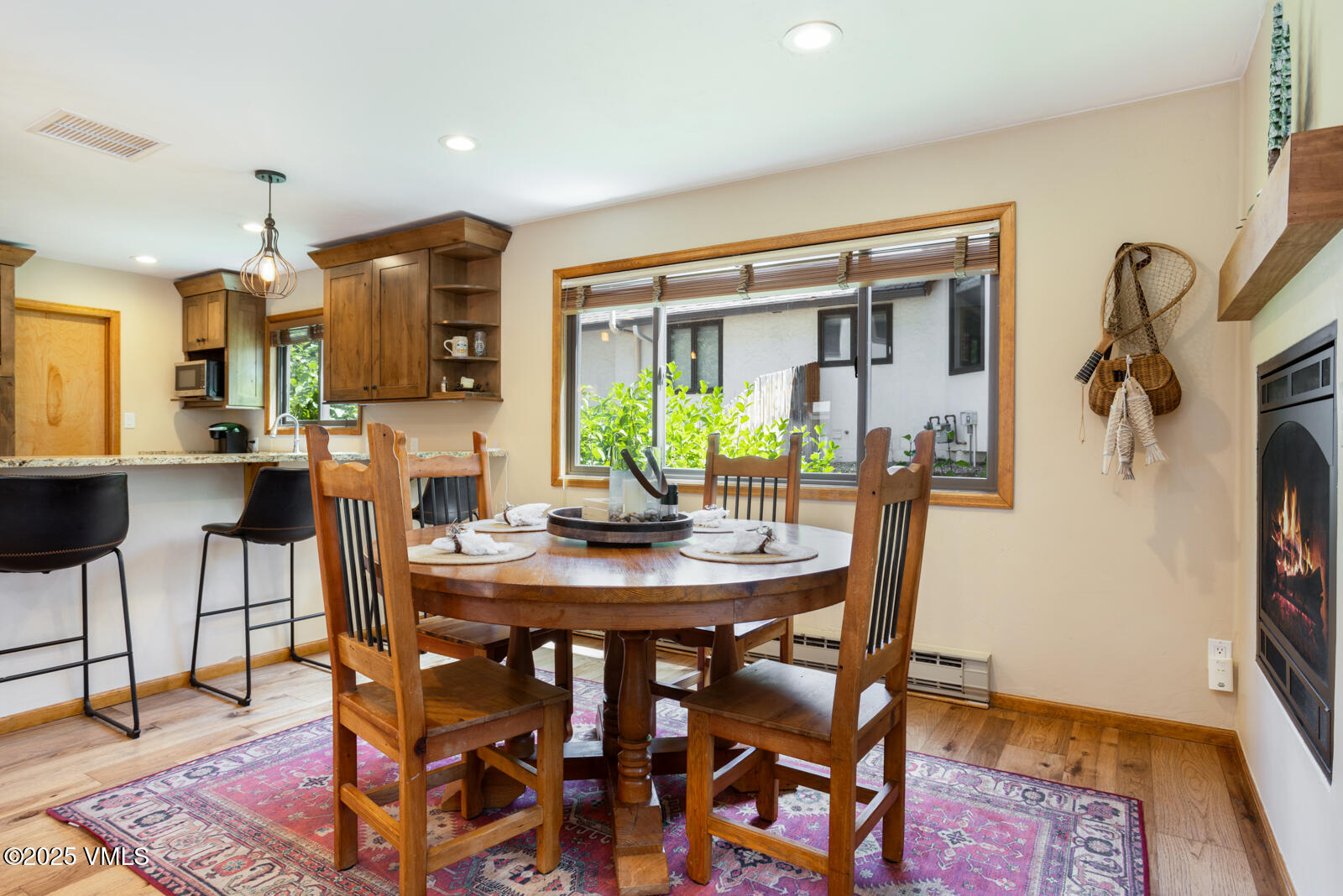 425 Deer Boulevard, Unit B Eagle-Vail, CO 81620 - Photo 6 of 26 a view of a dining room with furniture and wooden floor