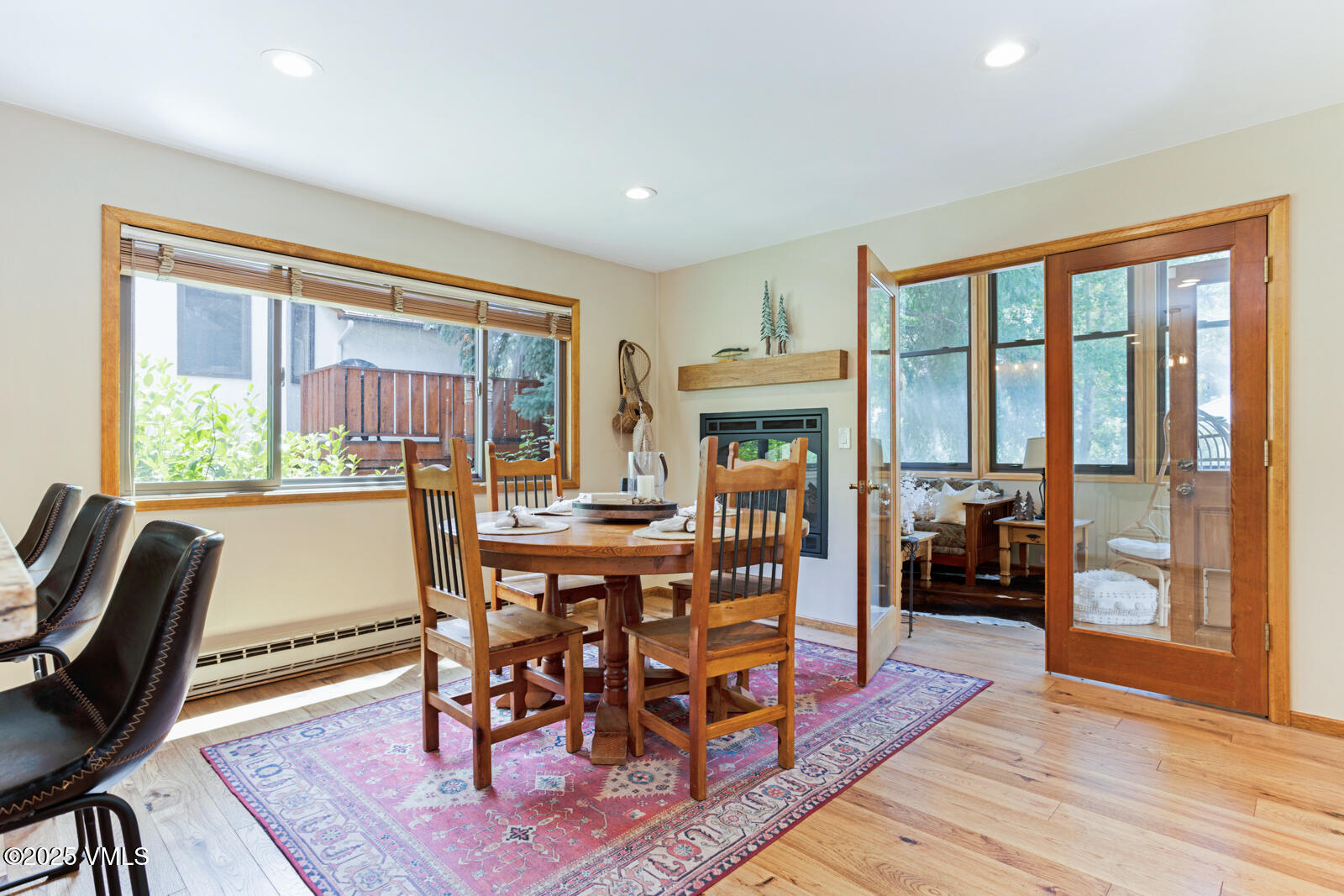 425 Deer Boulevard, Unit B Eagle-Vail, CO 81620 - Photo 8 of 26 a dining room with furniture window and wooden floor