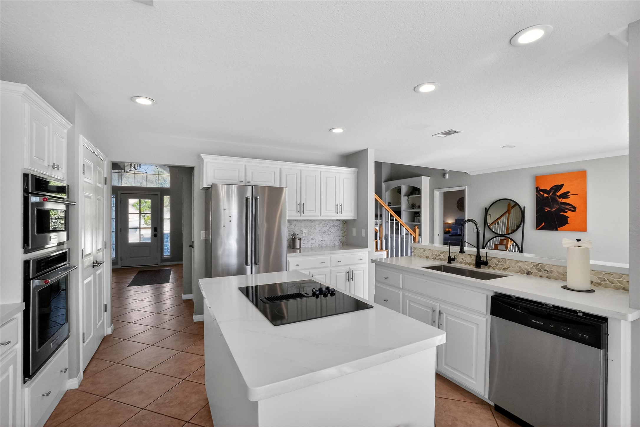 13624 Trautwein Road Austin, TX 78737 - Photo 3 of 38 Culinary delights await in this bright kitchen with a large island and ample counter space.