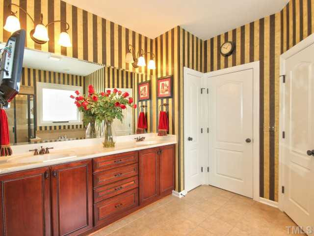 10149 Darling Street Raleigh, NC 27613 - Photo 16 of 25 You will also find this beautiful dual vanity, a HUGE walk in closet, separate powder room and linen closet. Master Bath/Spa