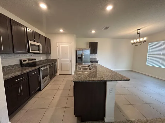 a view of hallway with stairs