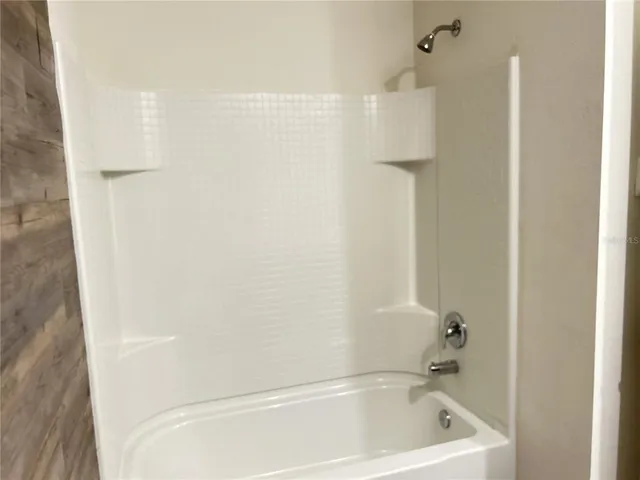 view of a bathroom with white door