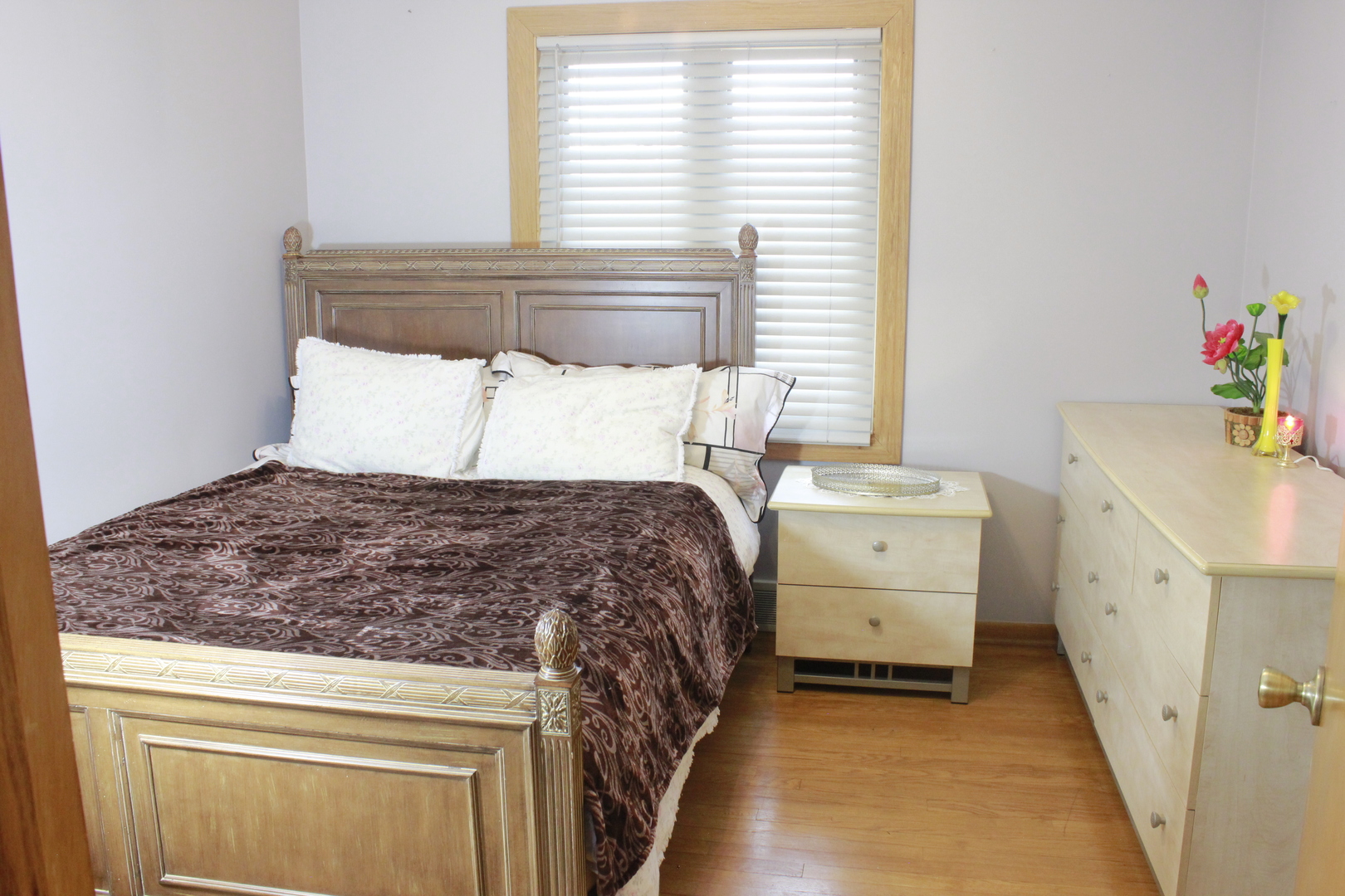 5639 Manor Lane Chicago, IL 60631 - Photo 16 of 29 a bedroom with a bed and a window