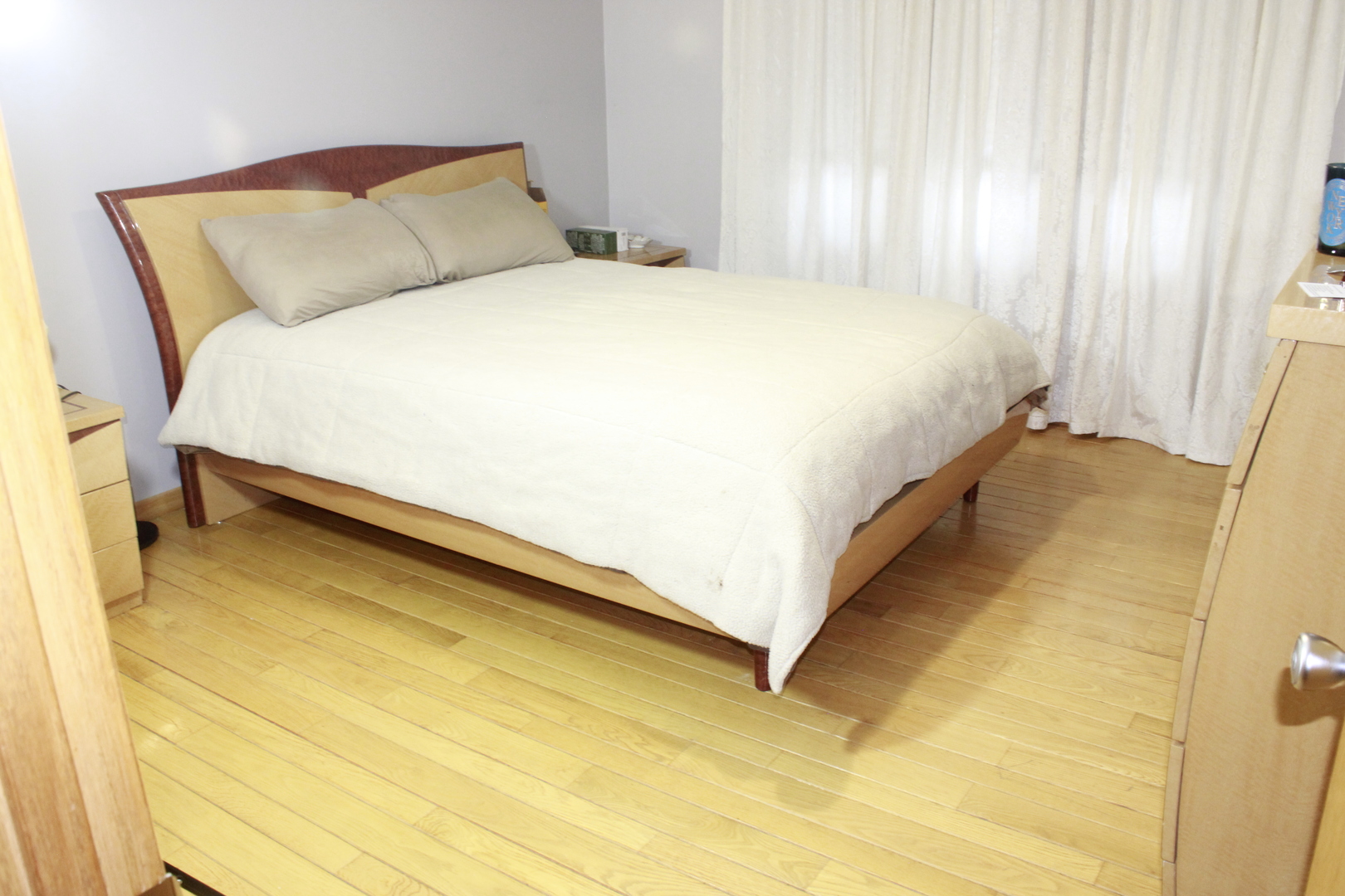 5639 Manor Lane Chicago, IL 60631 - Photo 17 of 29 a bed sitting in a bedroom next to a window