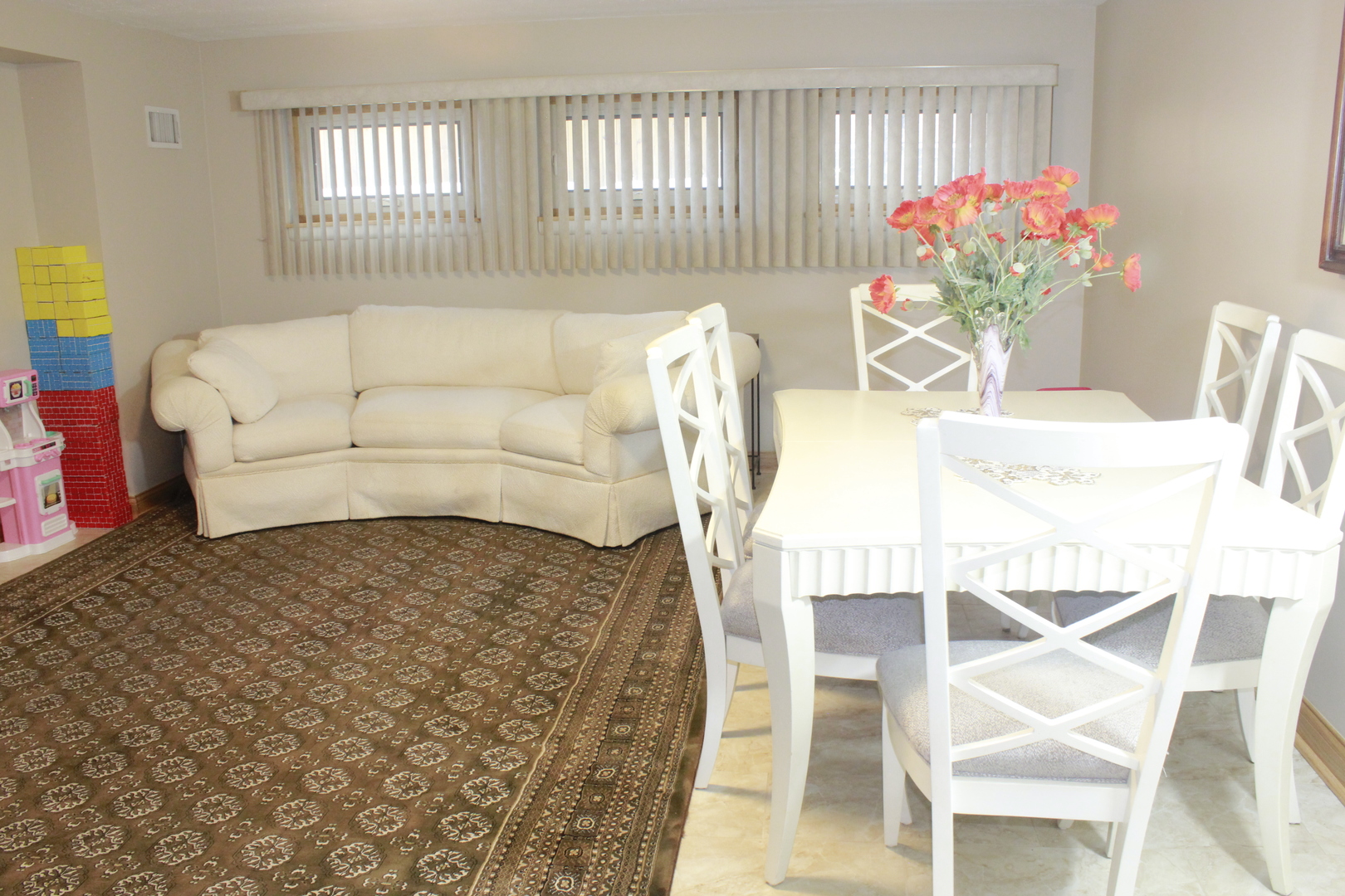 5639 Manor Lane Chicago, IL 60631 - Photo 21 of 29 a living room with furniture and flowers