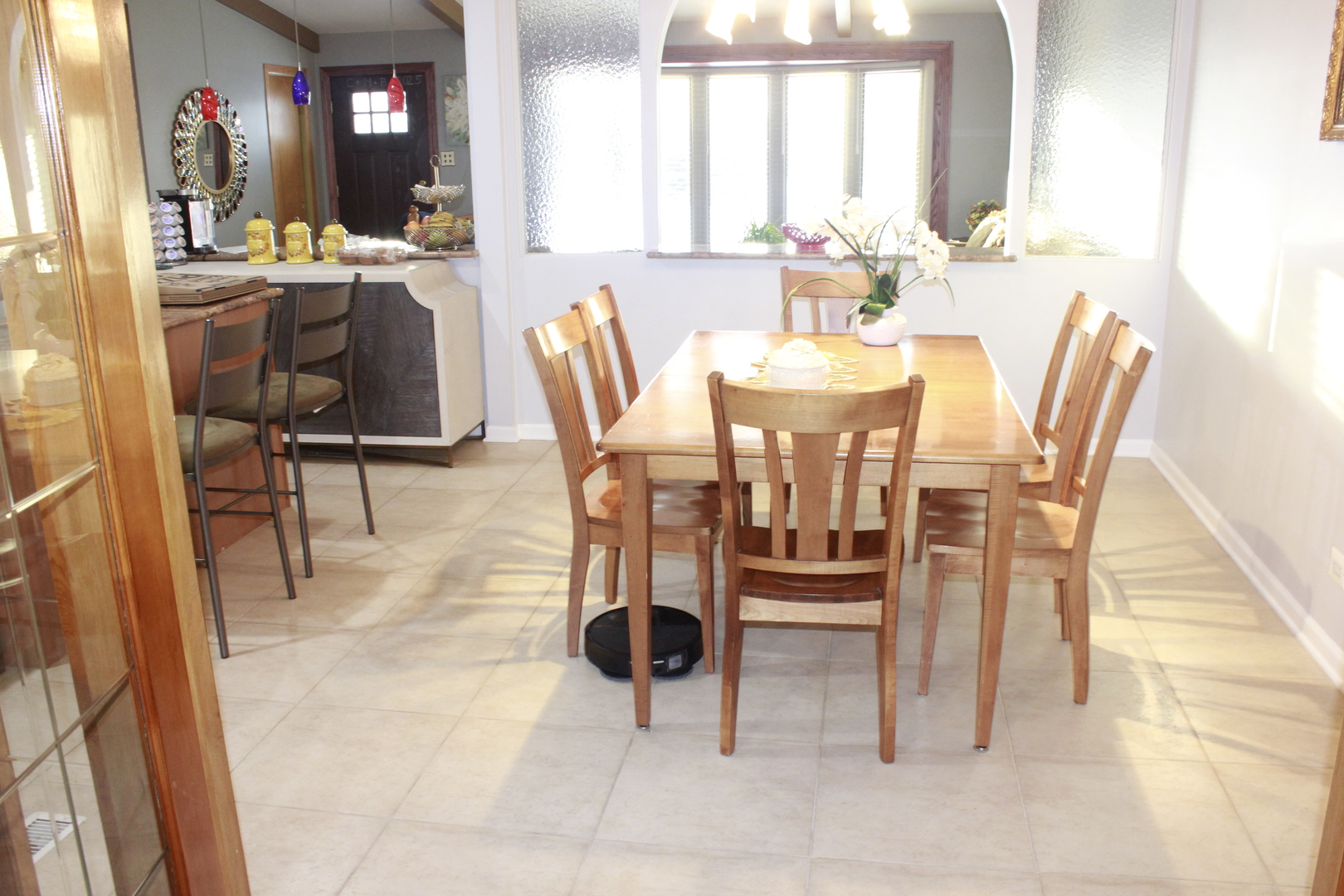 5639 Manor Lane Chicago, IL 60631 - Photo 28 of 29 a view of a dining room with furniture and a chandelier