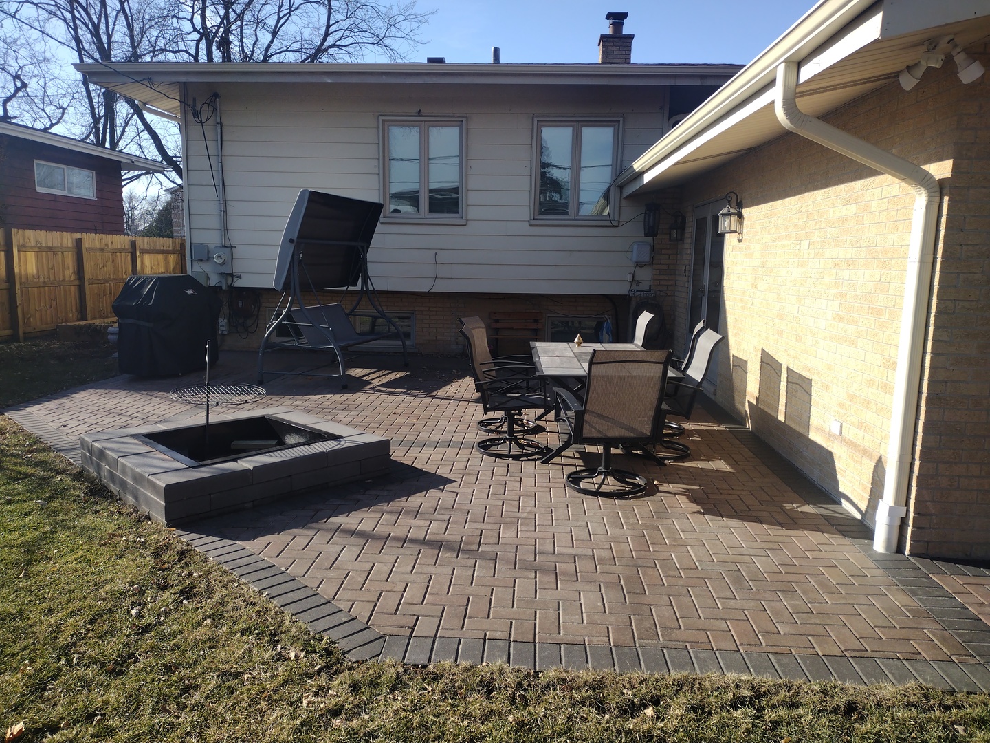 5639 Manor Lane Chicago, IL 60631 - Photo 4 of 29 a building outdoor space with patio furniture and potted plants