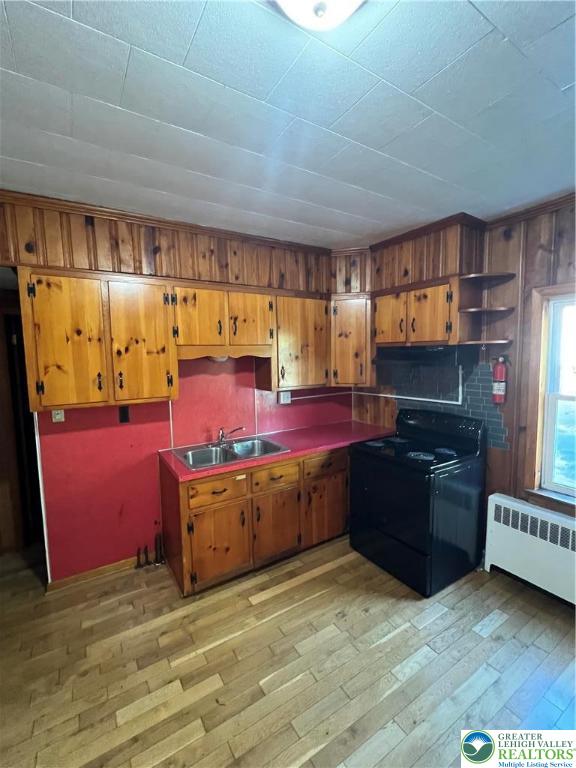 7108 Highway 873, Unit 3 Slatington, PA 18080 - Photo 17 of 19 a kitchen with stainless steel appliances kitchen island granite countertop a stove and a refrigerator
