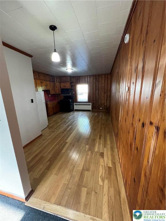 7108 Highway 873, Unit 3 Slatington, PA 18080 - Photo 7 of 19 a view of empty room with wooden floor and window
