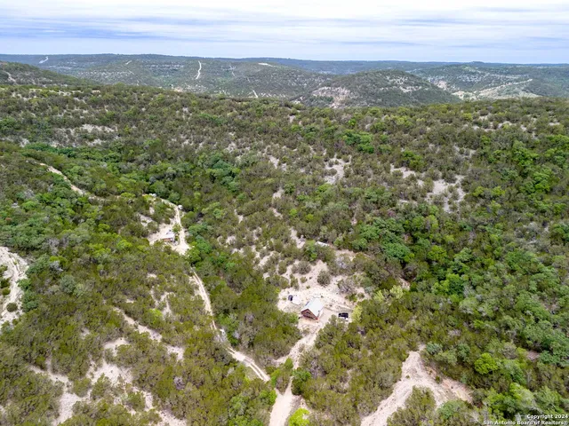 a view of city with green space