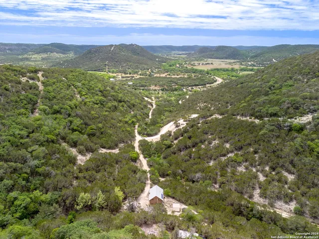 a view of city with ocean