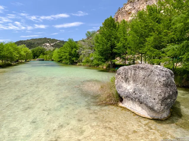 a view of a backyard of a house