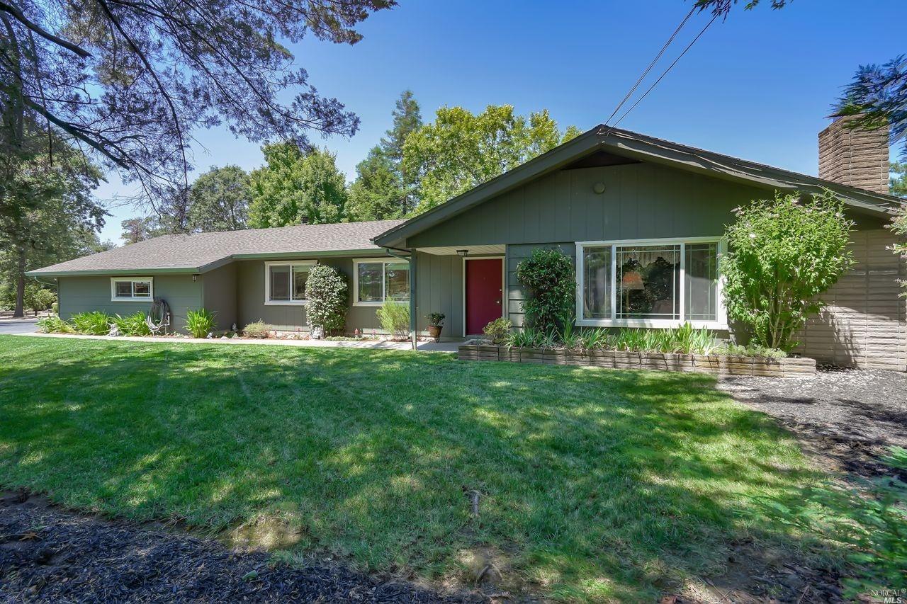 3655 Piner Road Santa Rosa, CA 95401 - Photo 1 of 1 a front view of house with yard and green space
