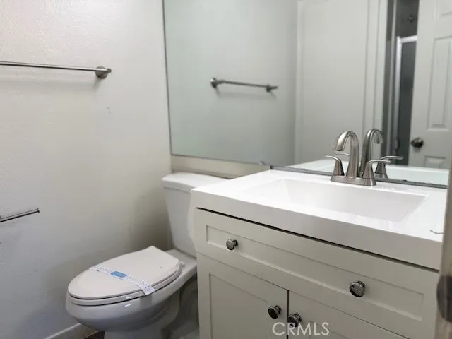a bathroom with a sink and a toilet