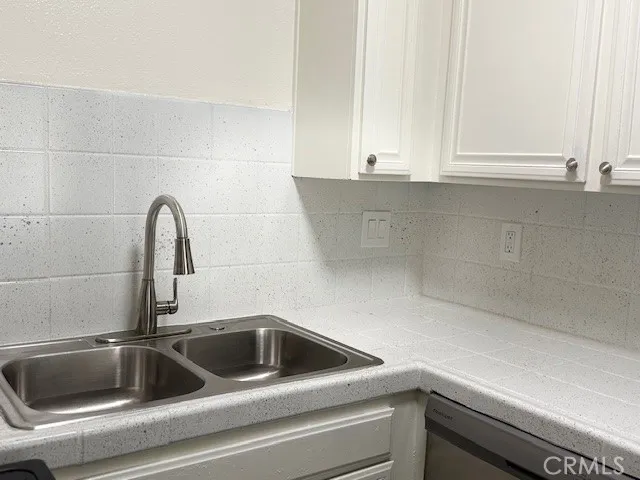 a close view of a sink and tap