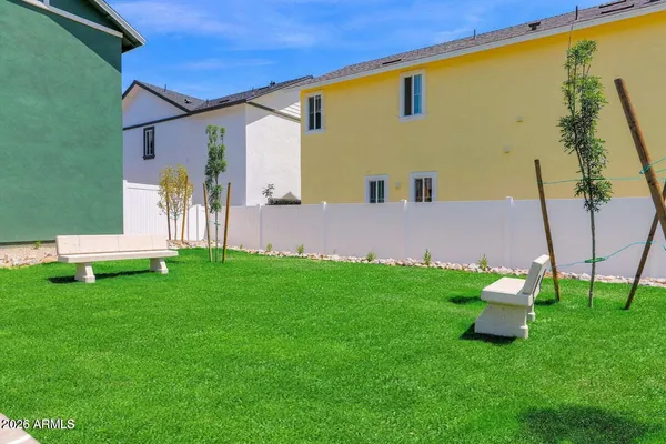 a house view with a garden space