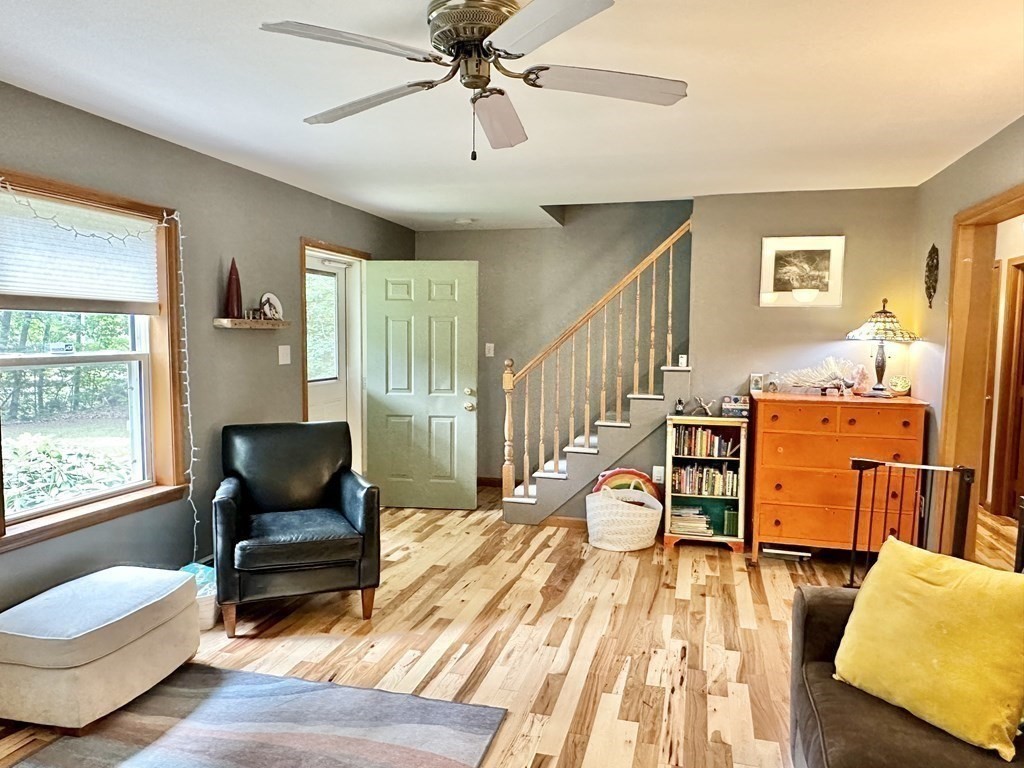 1388 Westhampton Road Northampton, MA 01062 - Photo 11 of 28 a living room with furniture and wooden floor
