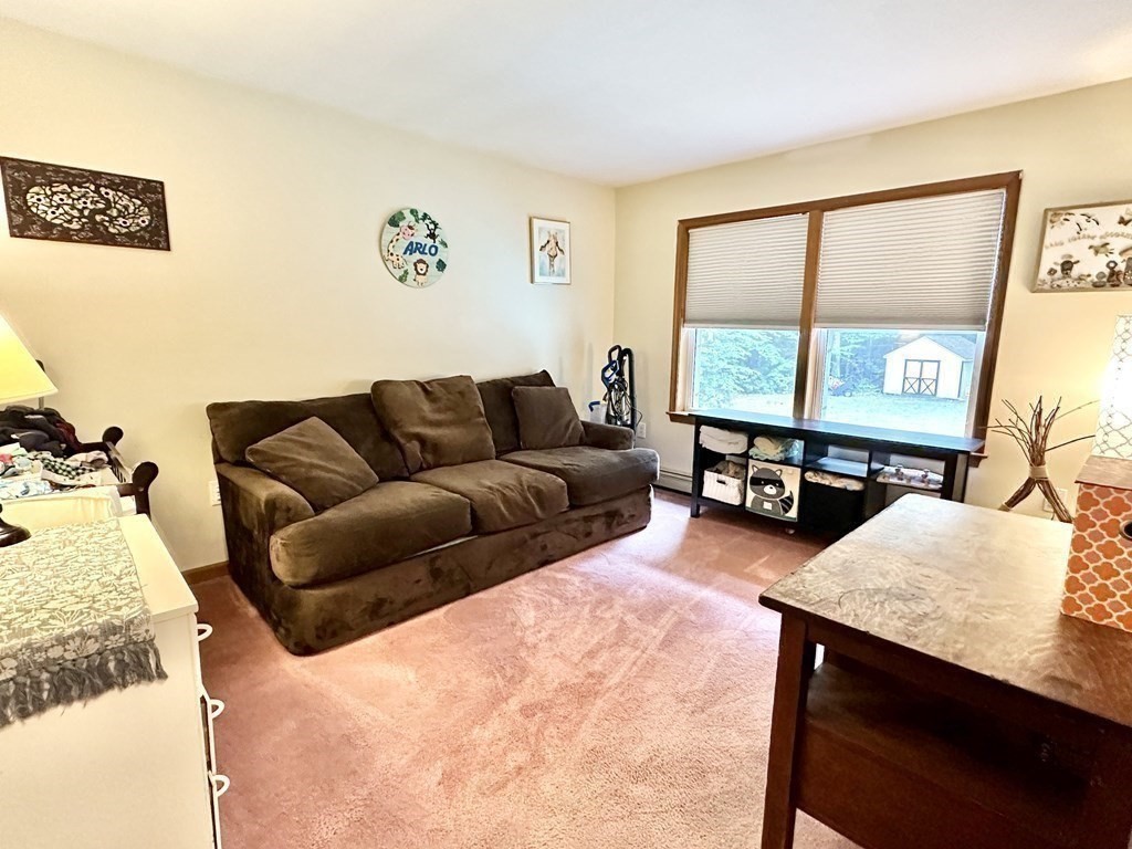 1388 Westhampton Road Northampton, MA 01062 - Photo 17 of 28 a living room with furniture and a large window