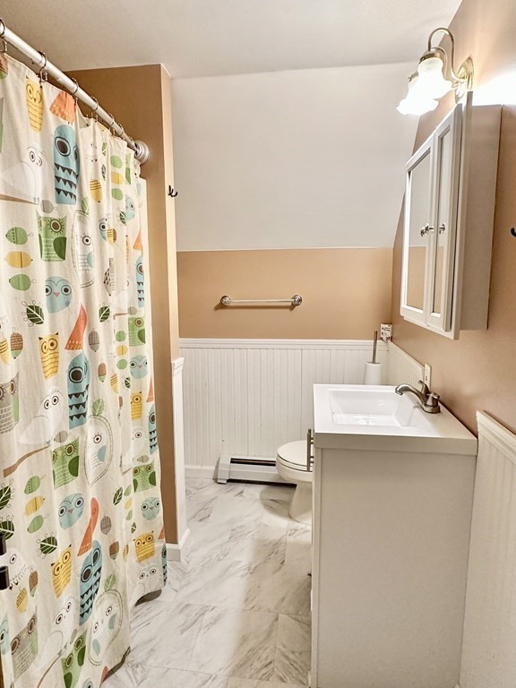 1388 Westhampton Road Northampton, MA 01062 - Photo 23 of 28 a bathroom with a sink and mirror