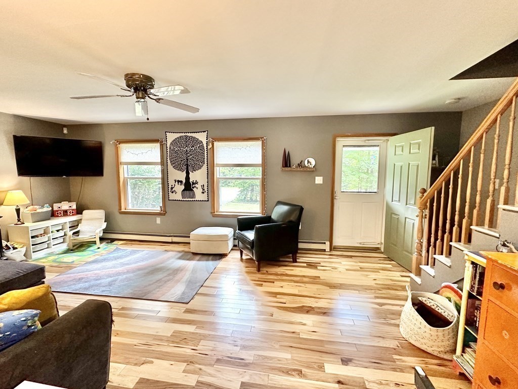 1388 Westhampton Road Northampton, MA 01062 - Photo 7 of 28 a living room with furniture and a flat screen tv