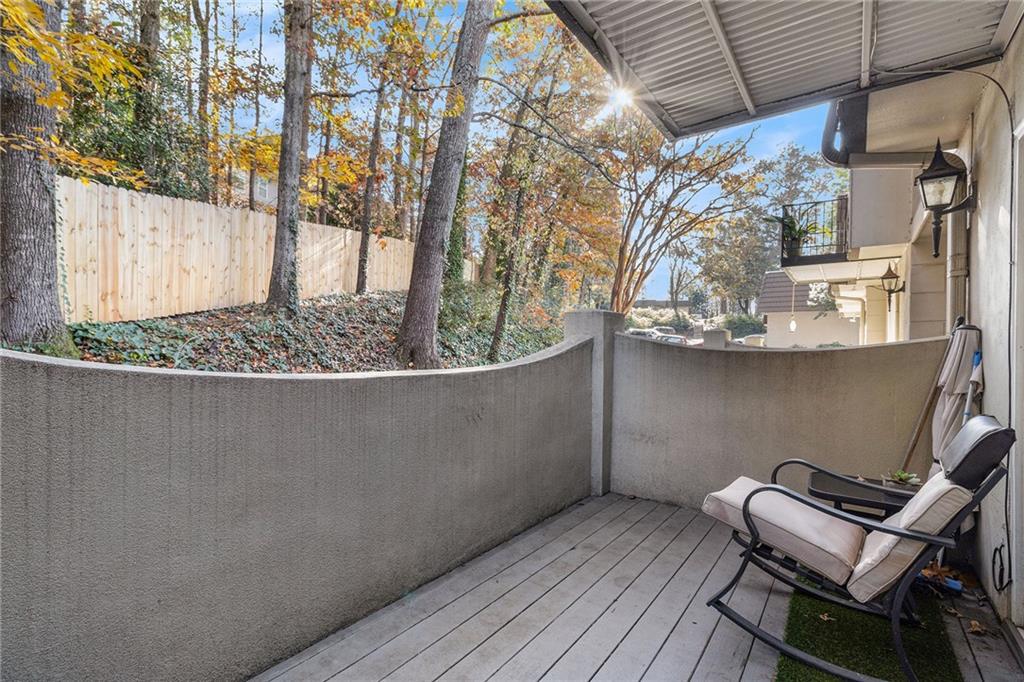 725 Dalrymple Road, Unit 3H Atlanta, GA 30328 - Photo 14 of 17 a view of balcony with wooden floor