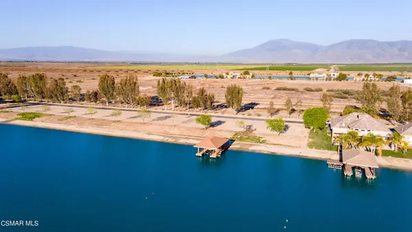 a view of an ocean and city