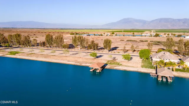 a view of an ocean and city