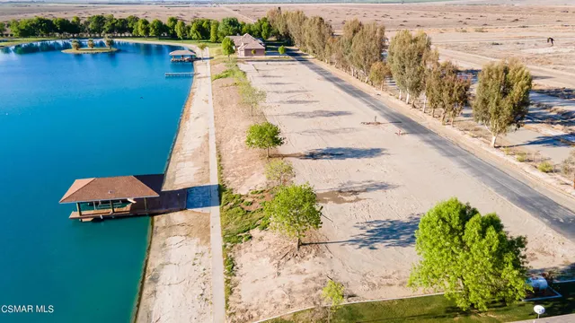 a view of a lake with beach